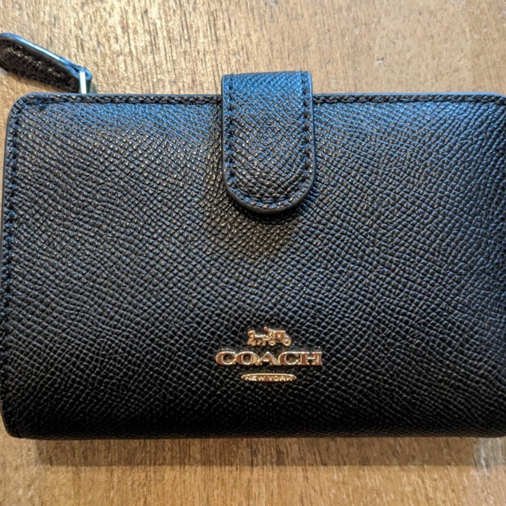 Coach Pebbled leather tri wallet